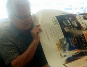Dr. Rodriguez, publisher, checking color proofs of the May/June issue with the printer.